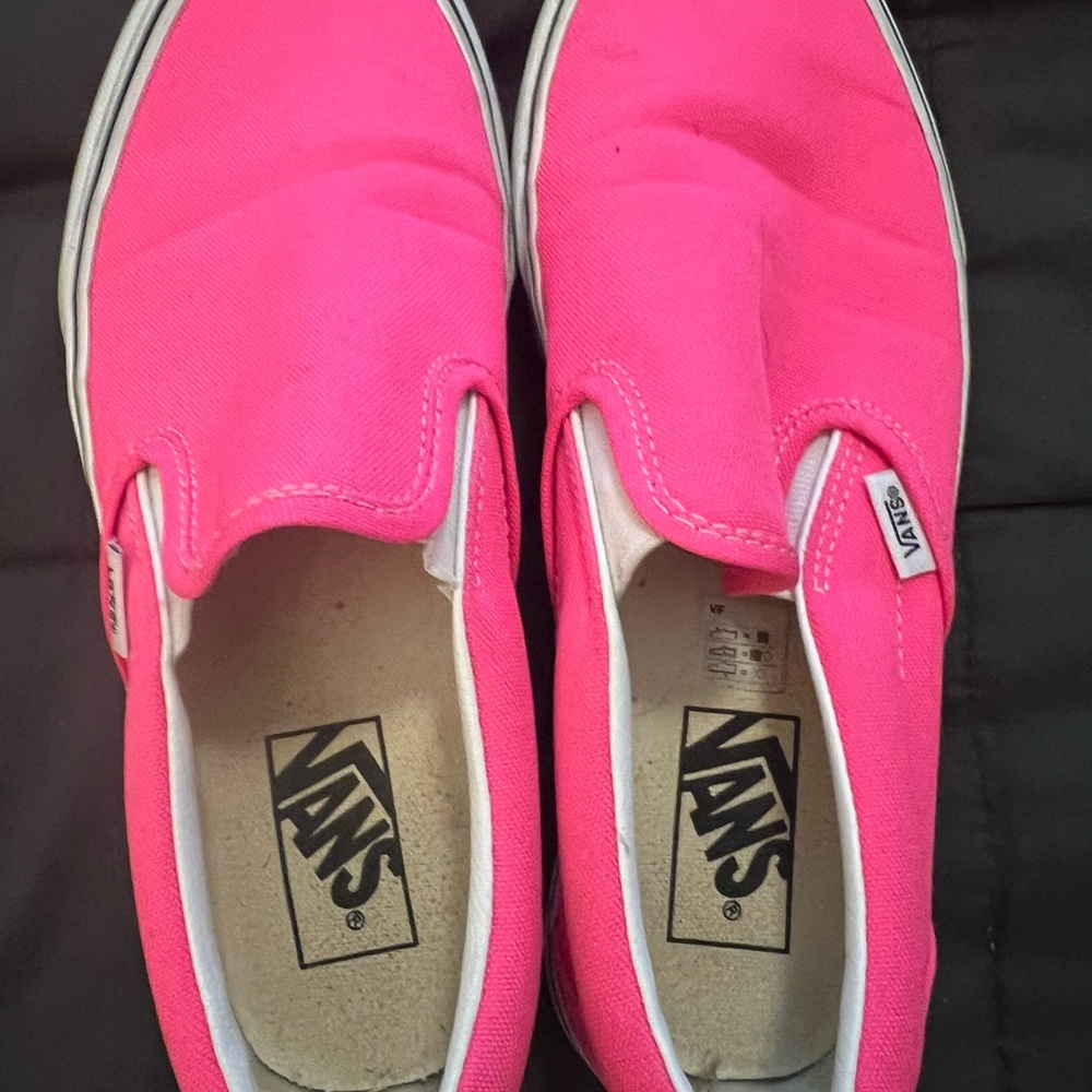 Hot pink Vans slip on tennis shoes